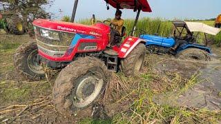 Stunts in Mud Sonalika 60 Stuck in Mud Badly Pulling by Mahindra Arjun NOVO 4x4 Tractor