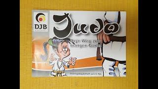 Orange Gurt Prüfungsprogramm mit Judopuppe