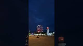 Ferris Wheel with light house #light #fun #georgia #winter #travel #batumi #fyp