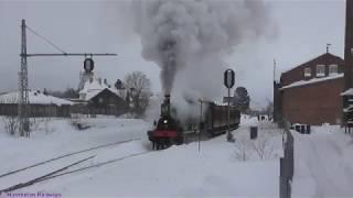 Steam train, snow, steam and loco from 1861, march 2019 in Norway.