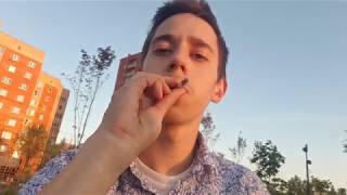 Smoking non filter cigarette at the park (18+)