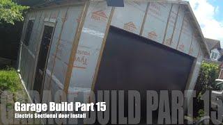One man DIY Double Timber Garage Build part 15 - CarTeck Electric sectional door installation
