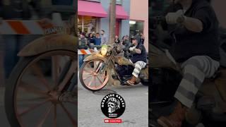 Man With Harley Davidson Road King Raw Custom Bagger On The Street