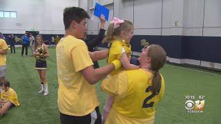 Rain Doesn't Stop Highland Park High School's Annual Buddy Bowl