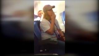 Watch This Woman Smoke A Cigarette on a Plane and Blame the Man Next To Her!