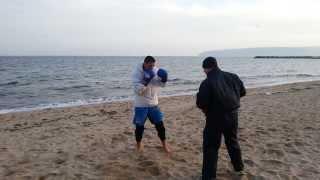 Stoyan Koprivlenski pads on the beach by Krasimir Dimov