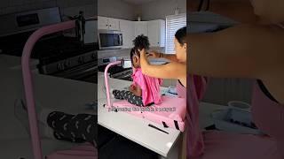 Styling her hair for the week 