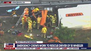 Driver of 18-wheeler trapped in truck after crash in Long Beach, California