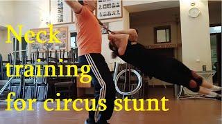 Neck training for circus stunt