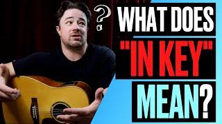 What does "in key" mean when playing guitar?