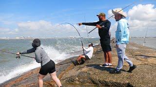 Fisherman risks it all Catching 100lb BEAST Fishing the Jetty!! INSANE FISHING VIDEO!