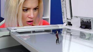 Zoom Zoom: Shrinking Man Stuck in The Printer Next to The Giantess