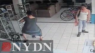 Raw: Woman in Costa Rica steals TV by hiding it under dress