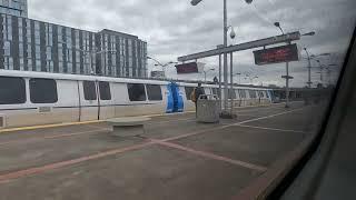 BART Orange and Yellow line trains meet at MacArthur