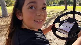 Megan Driving Golf Cart