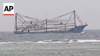 Chinese ship runs aground off Philippines-occupied island in disputed South China Sea