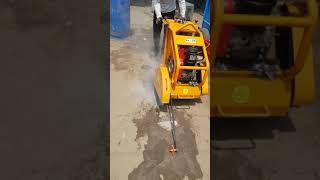 Concrete cutting machine engine operated