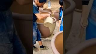 Coating terracotta pots with clay slip – Smooth finish through mindful craftsmanship