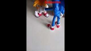 sonic knocks out tails