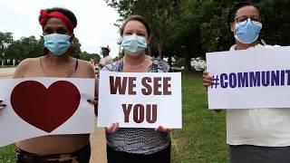 UNC Medical Center and UNC REX employees demonstrate their commitment to health equity. (UNC Health)