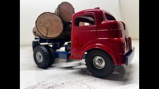 STRUCTO LOGGING TRACTOR TRAILER HAULING GIGANTIC CEDAR LOGS