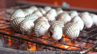 Grilled cockle with Thai spicy dipping sauce. Street food Bangkok.