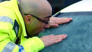 PC Hugh McKirdy (Grado) de-ices a car windscreen with a munchy box - Scot Squad