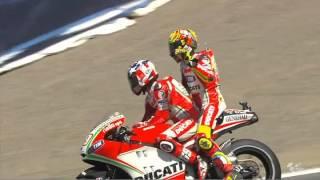 Valentino Rossi gets a lift from team-mate Nicky Hayden