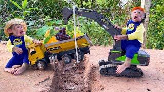 Bu Bu drives an excavator to rescue a truck stuck in a pit