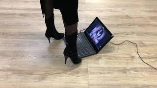 Girl hard crush laptop with high heels boots
