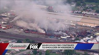 Madison, Illinois warehouse still smoldering after fire