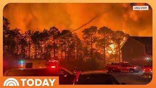 Wildfires rage in North and South Carolina, thousands evacuate