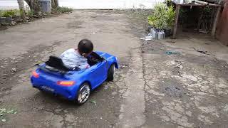 My baby Playing his New Car