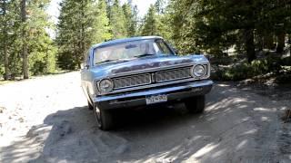 A 1968 Ford Falcon and a rocky road.