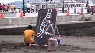 Street artists painting a big surprise