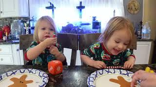 Twins decorate gingerbread people