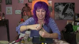 Pyramid Candle for Money Spells - Witchcraft How To with Madame Pamita