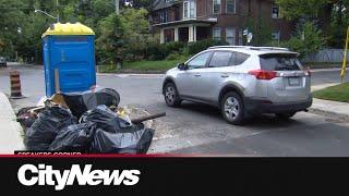 Garbage piles left behind by road crews leave Toronto residents frustrated