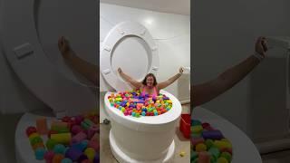 GOING UNDER and OVERFLOWING the Giant Toilet Colorful Pool #shorts