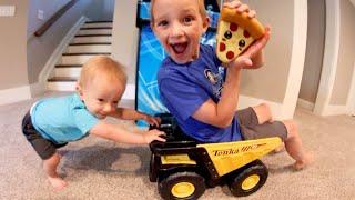 Baby Pushes Big Brother In Truck!