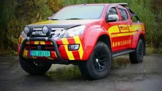 Izusu D-Max Arctic Trucks recovery vehicle wrapped in Avery Cardinal red