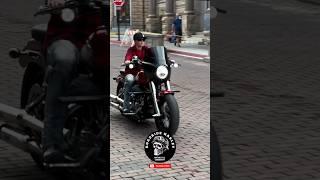 Raw Woman With Harley Davidson Fat Boy Red Version at Daytona Beach Bike Week 2025