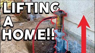 Lifting a home's foundation with Push Piers