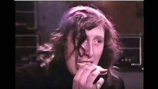 Atomic Rooster 70's band singer eats sandwich on stage live Black Snake