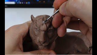 Sculpting a tiger figure from  clay and creating a silicone mold