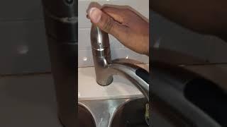 Home made plumber fixing a leaking kitchen faucet part 1