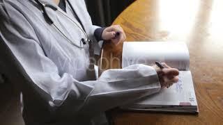 Physician Makes Records | Stock Footage - Envato elements