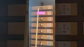My First Omikuji Experience: Getting a Bad Fortune and Tying It Away 