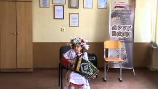 8-year-old girl playing harmon, "Peddlers"