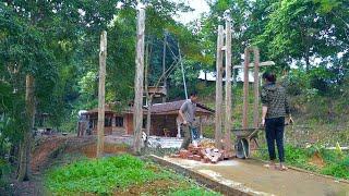 Progress of the 2nd day of construction of the Safety Gate: Erecting wooden pillars,solid foundation